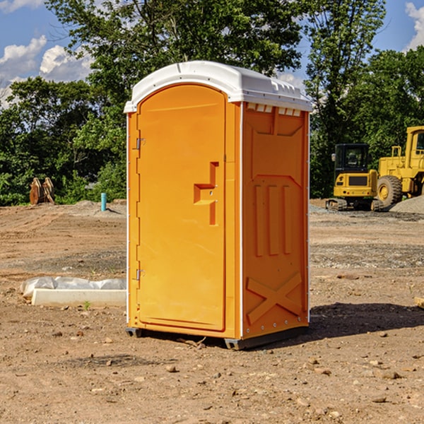 how often are the portable restrooms cleaned and serviced during a rental period in Omer